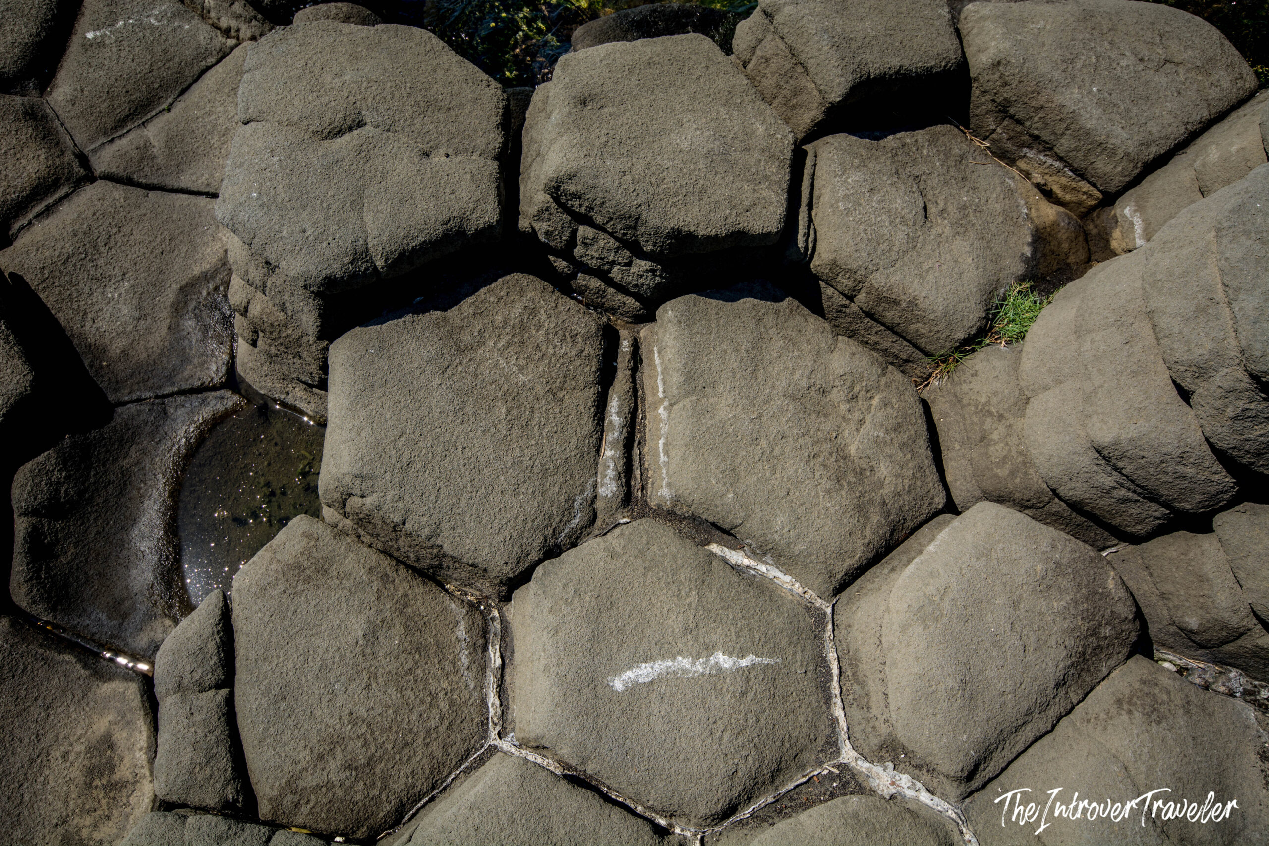 Close-up of hexagonal basalt columns formed by volcanic activity on Mount Etna, Sicily