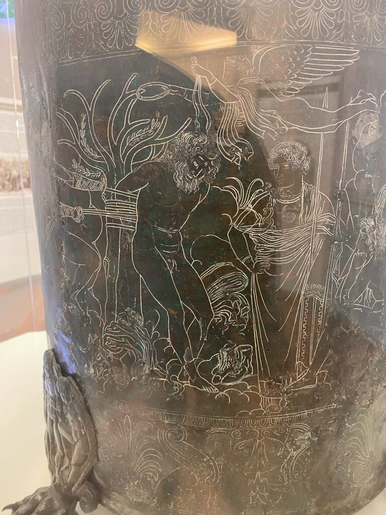 Engraved bronze cista detail showing mythological figures, Villa Giulia Etruscan Museum, Rome