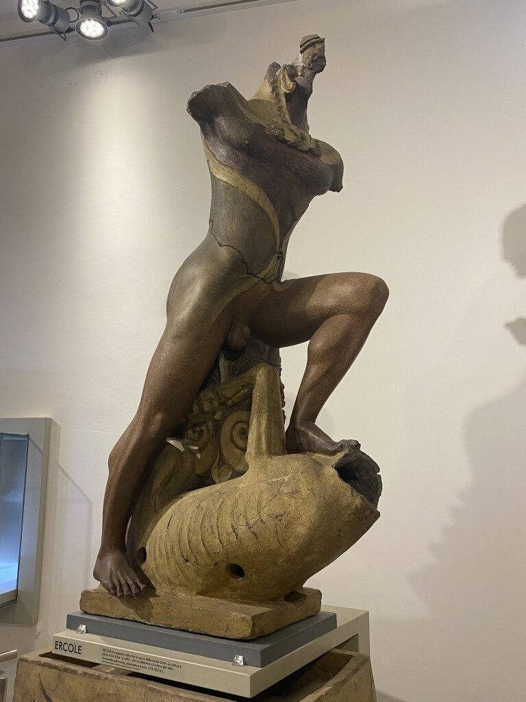Ercole terracotta sculpture at Villa Giulia Etruscan Museum, Rome, partially restored figure on display