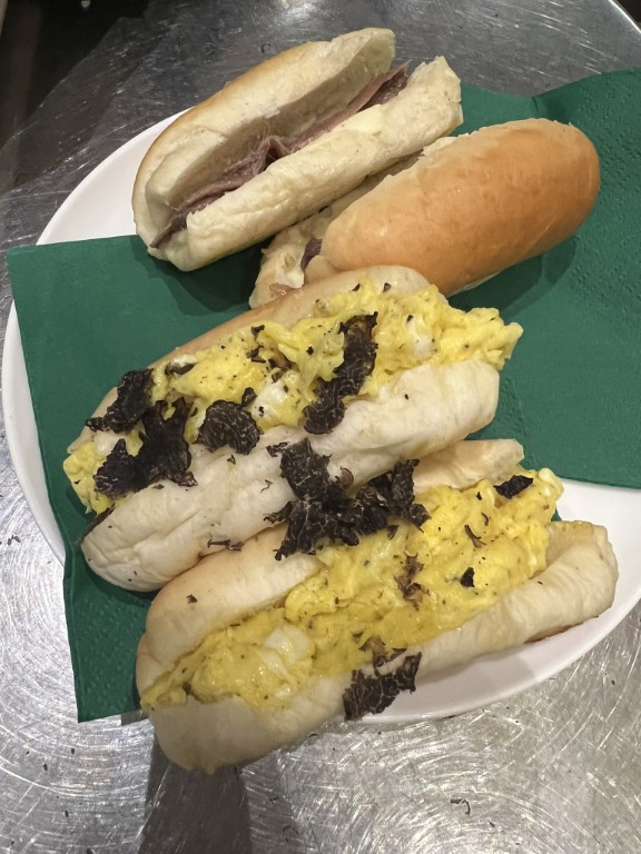 Procacci 1885 truffle rolls with scrambled eggs and shaved black truffle, Florence