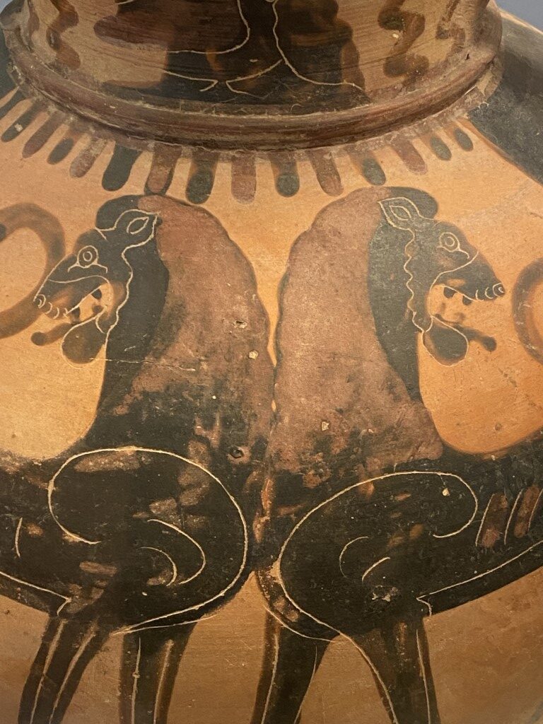 Ancient Etruscan black-figure ceramic vessel with paired animal motifs, Villa Giulia Museum Rome