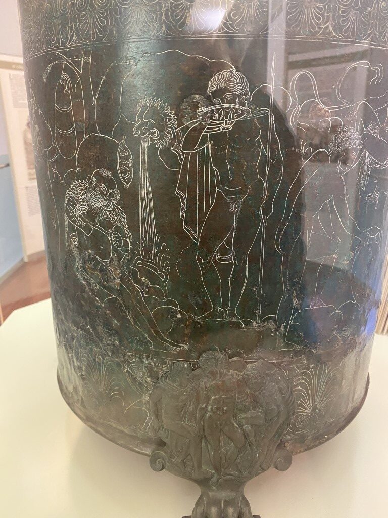 Ancient Etruscan engraved bronze cista on display at Villa Giulia museum, Rome