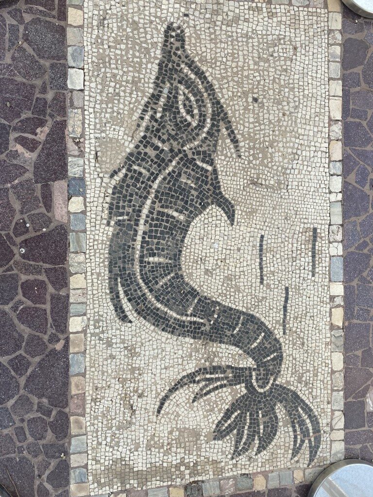 Ancient Roman-style floor mosaic of a shrimp at Villa Giulia Etruscan Museum, Rome