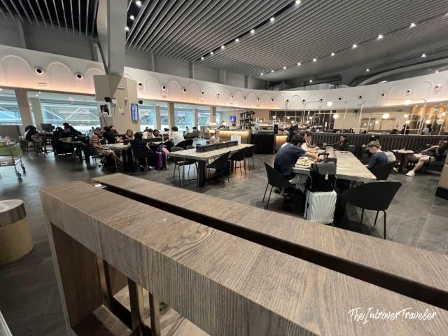 Spacious seating area inside Plaza Premium Lounge at Rome Fiumicino airport, Terminal 3