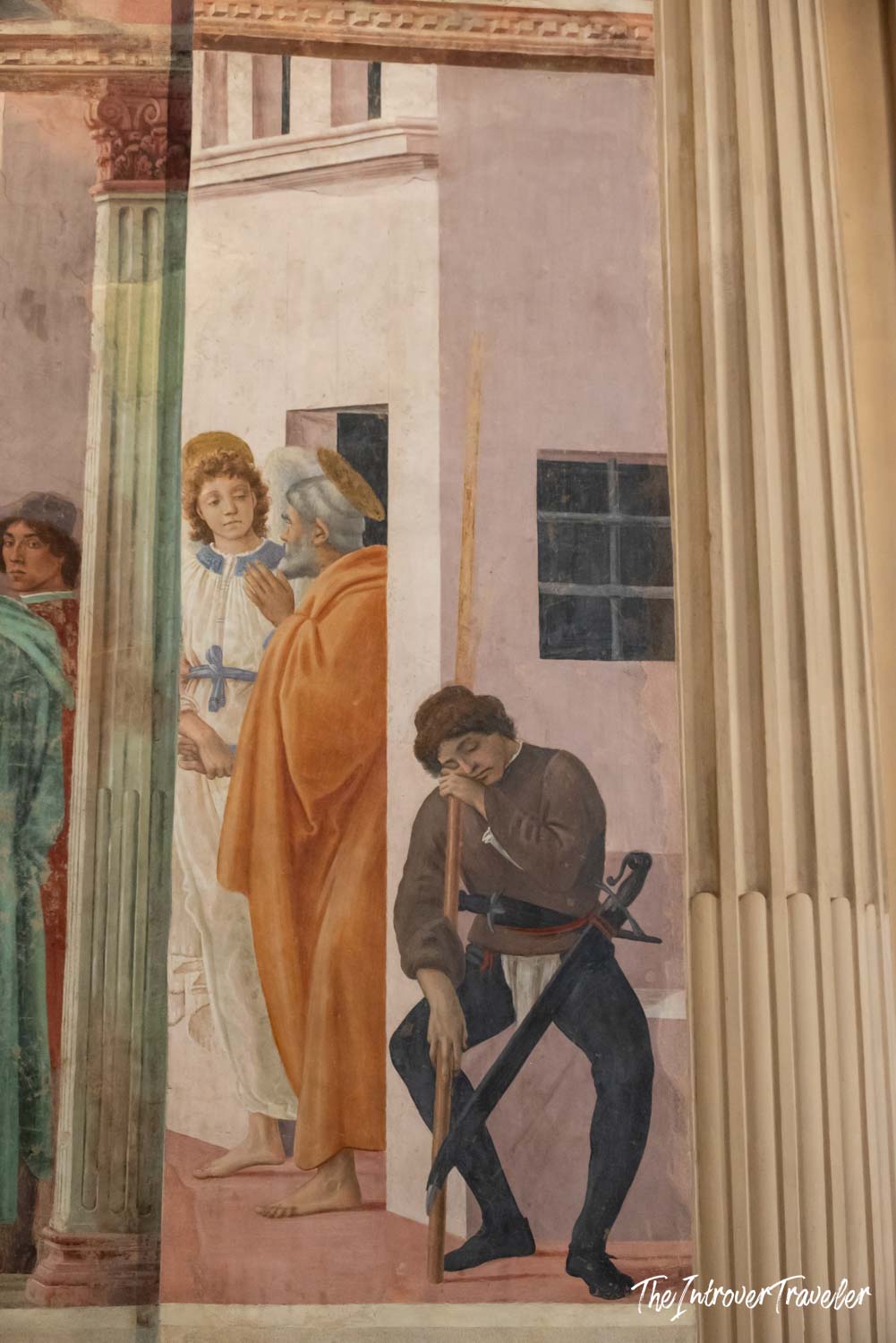 Detail of a Renaissance fresco in the Brancacci Chapel, showing a sleeping guard and haloed figures