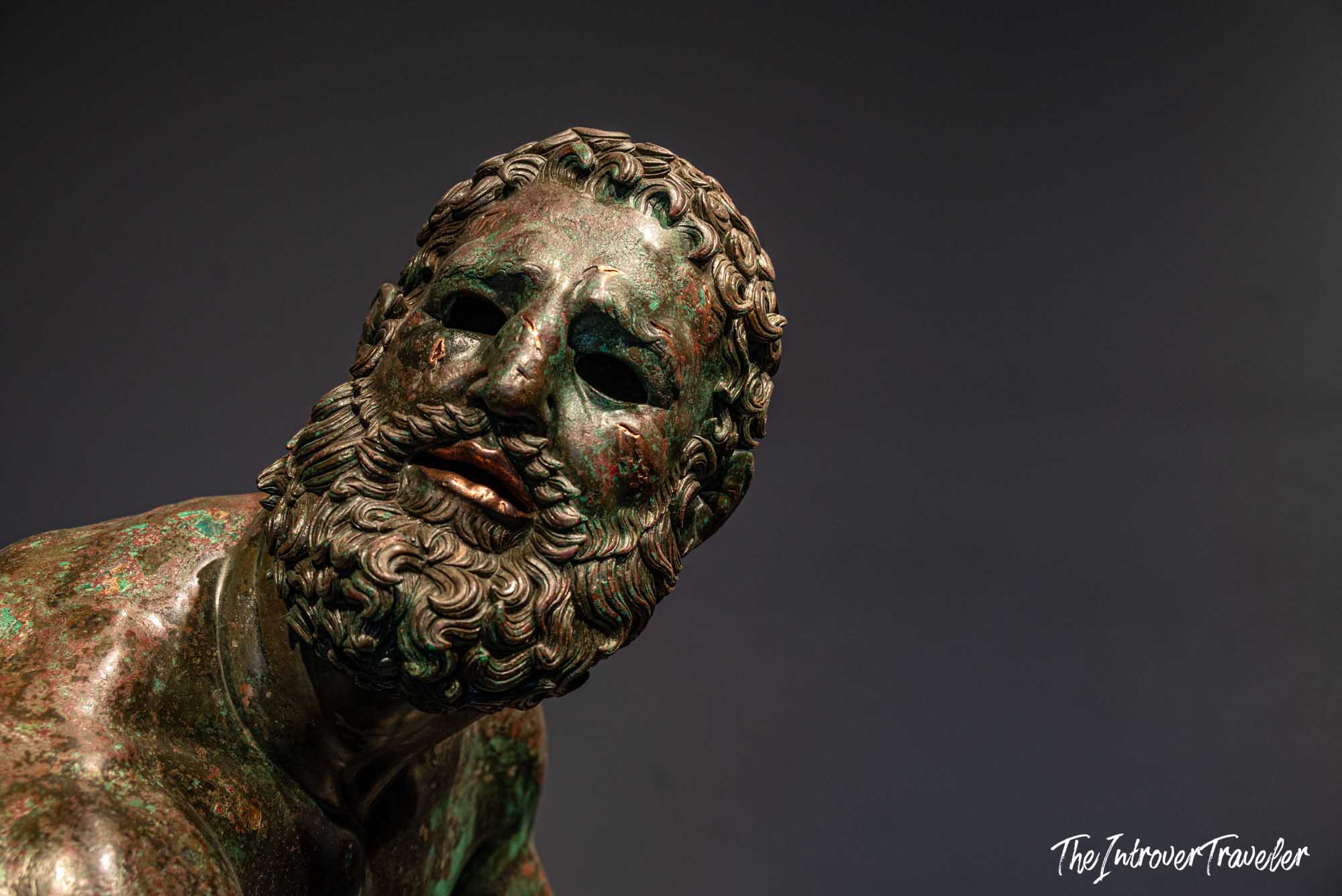 Close-up of the Boxer at Rest face, ancient Greek bronze at Palazzo Massimo, Rome