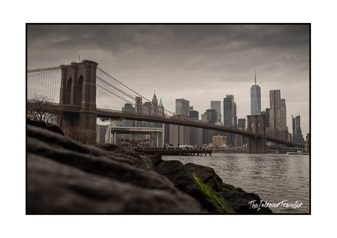 Brooklyn Bridge and Lower Manhattan skyline viewed from DUMBO on a moody overcast winter day