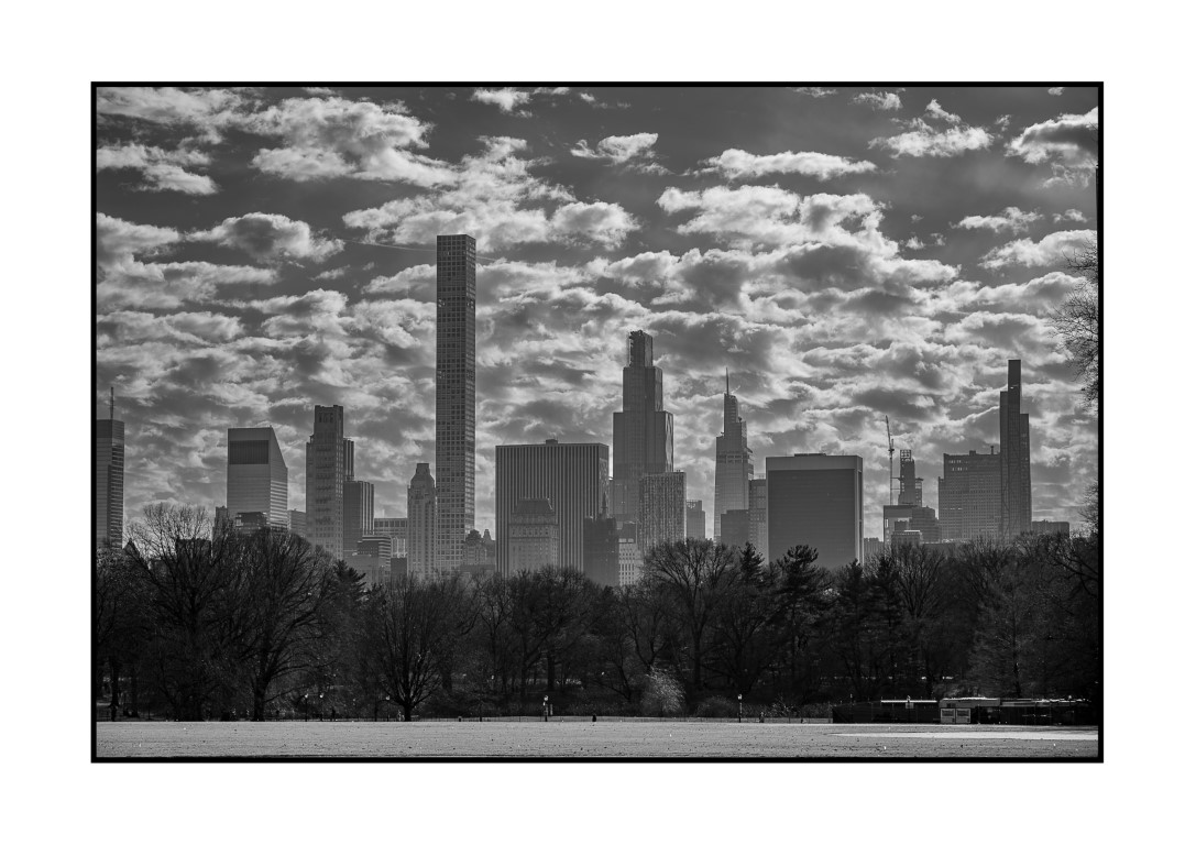 Black and white view of Midtown Manhattan skyline from Central Park in winter