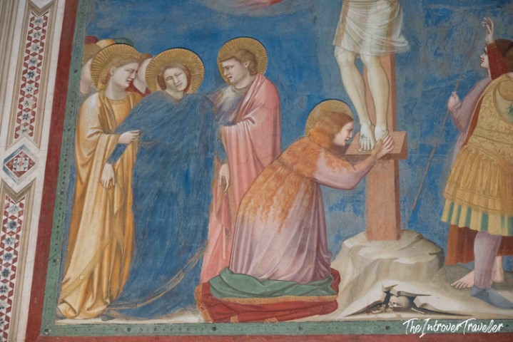 Giotto fresco detail in the Scrovegni Chapel, Padua, showing figures mourning at the Crucifixion