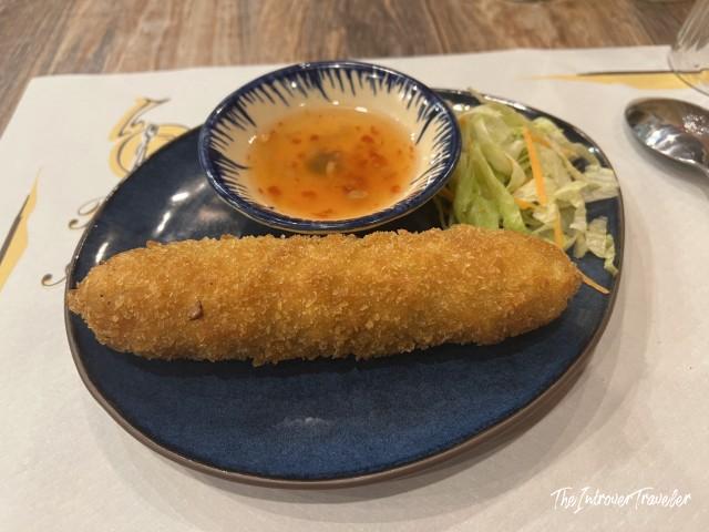 Crispy fried Vietnamese spring roll with sweet chili dipping sauce, served at Fratelli Vietnam in Bologna