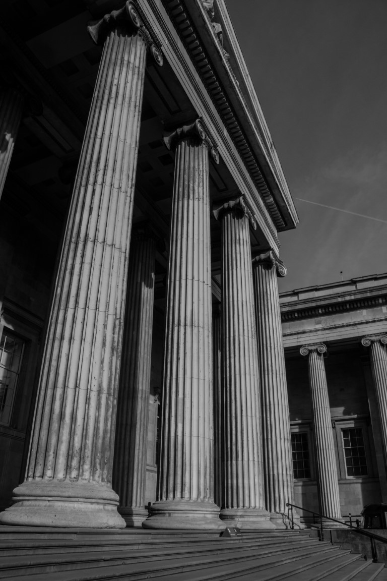 Towering Ionic columns of the British Museum neoclassical facade, London