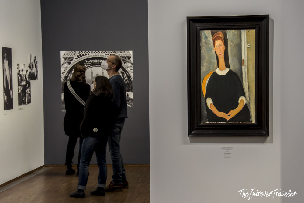 Visitors viewing Modigliani's Jeanne Hebuterne portrait at the Albertina Museum Vienna exhibition