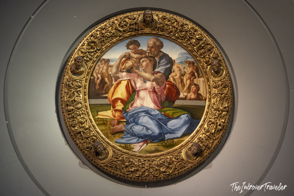 Doni Tondo by Michelangelo, circular tondo painting in ornate gilded frame, Uffizi Gallery Florence