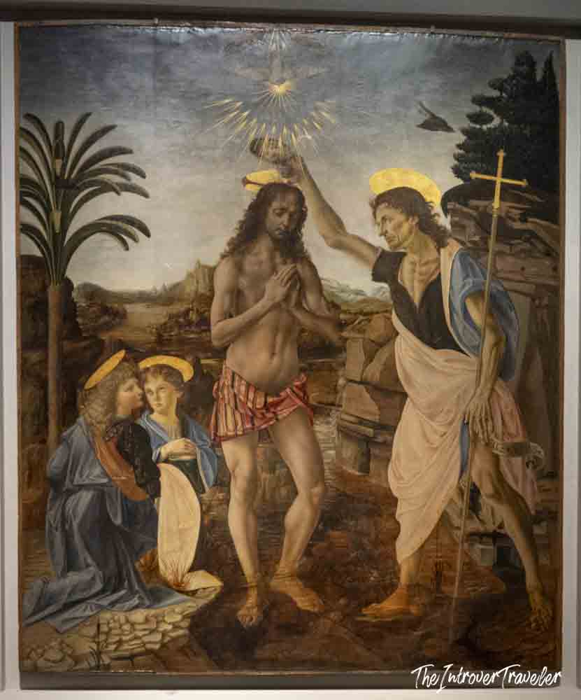 Baptism of Christ by Verrocchio and Leonardo da Vinci, a key masterpiece at the Uffizi Gallery Florence