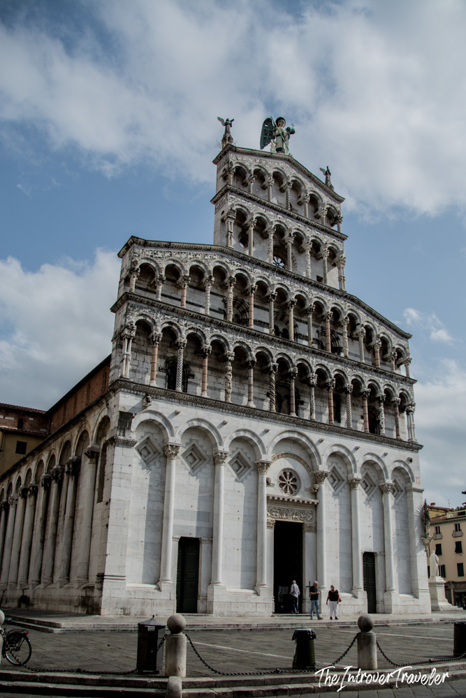 San Michele in Foro church facade in Lucca, Tuscany, with its tiered Romanesque marble arcades