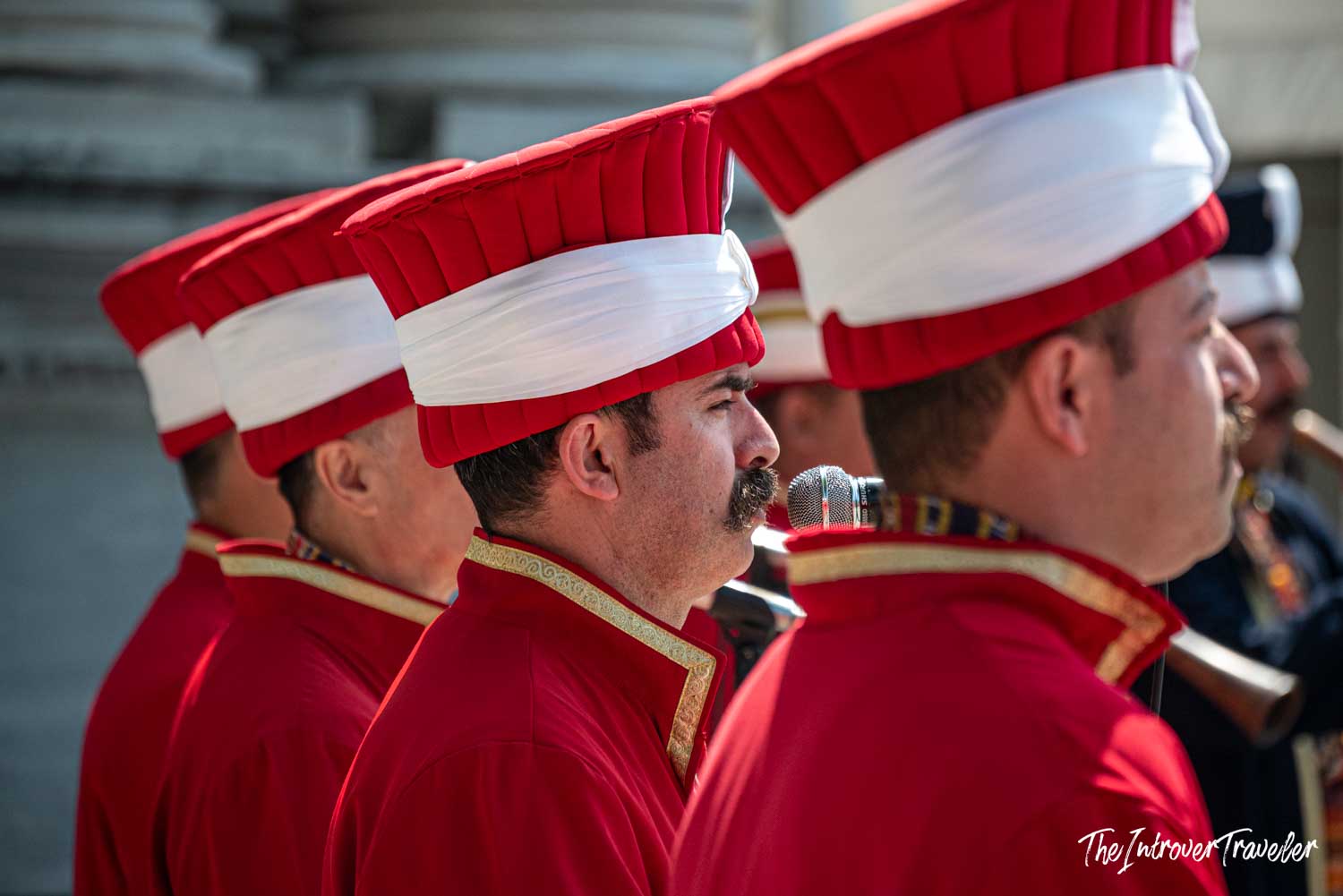 Ottoman Mehter band performers in red and white uniforms at Dolmabahce Palace, Istanbul