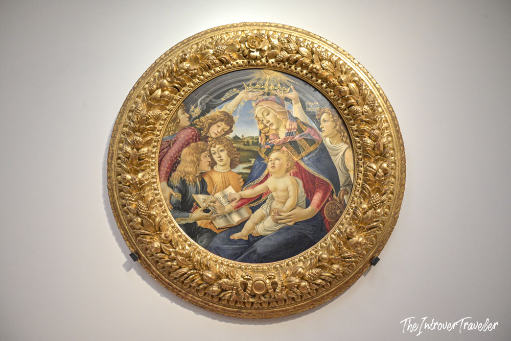 Botticelli's Madonna of the Magnificat tondo with gilded frame, displayed at the Uffizi Gallery Florence