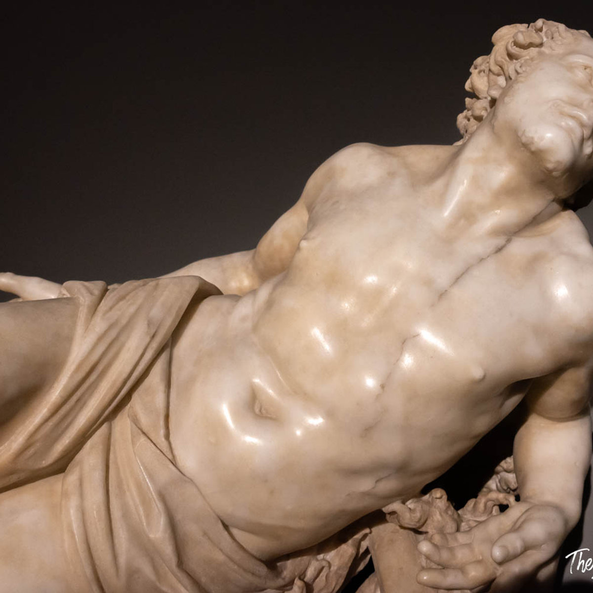 Close-up of a reclining marble figure, detail from a Bernini sculpture at the Palazzo Barberini exhibition