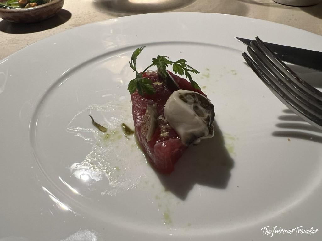 Tuna tartare with cream and herb oil at Trattoria Da Lucio, a fine dining seafood spot in Rimini