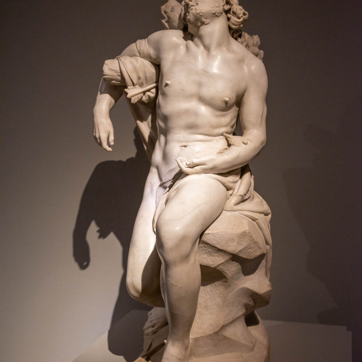 Baroque marble sculpture of Saint Sebastian by the young Bernini, on display at Palazzo Barberini
