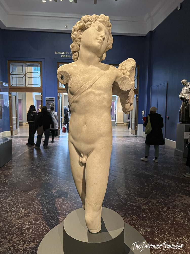 Ancient Roman marble Eros statue on display in the Metropolitan Museum of Art, New York