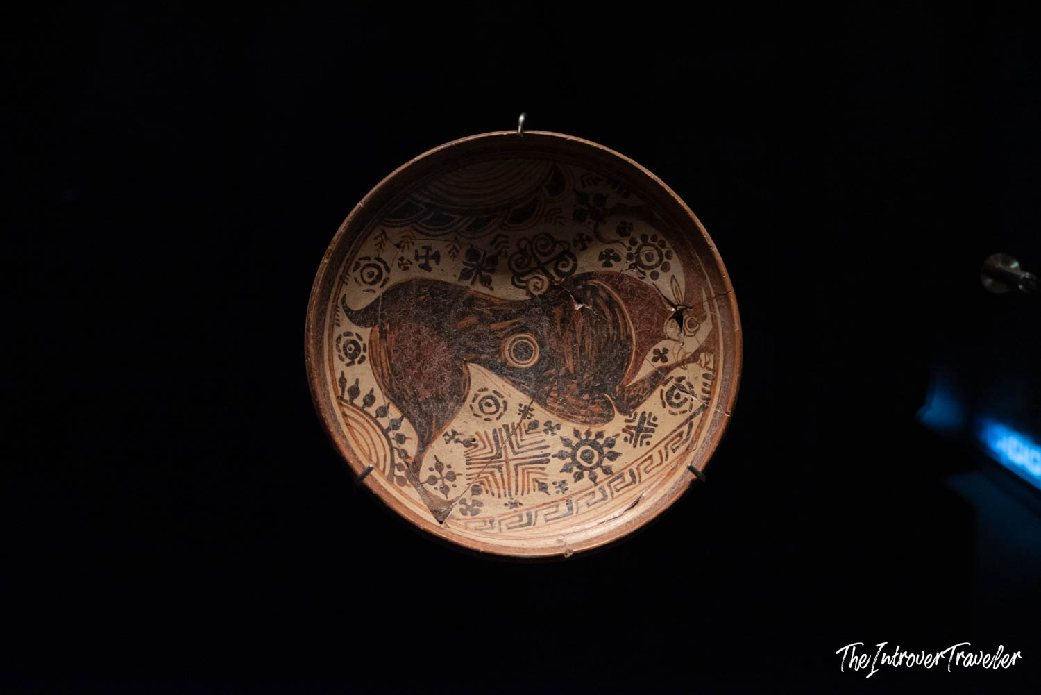 Ancient painted ceramic bowl with bull motif and geometric patterns, Istanbul Archaeological Museum exhibit