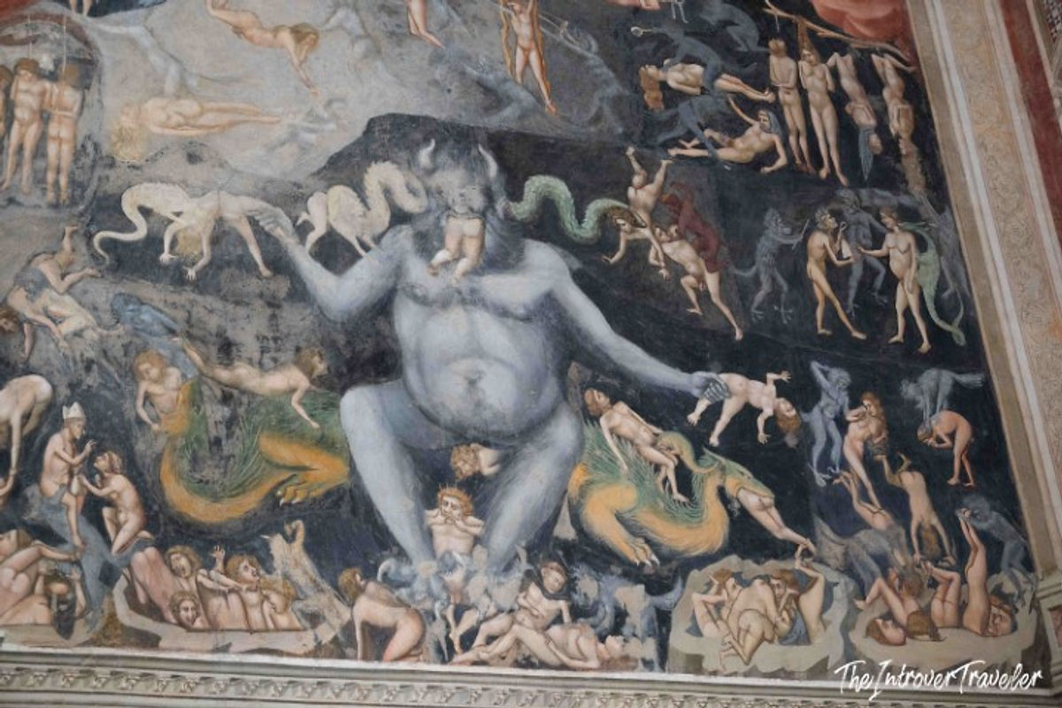 Detail of Giotto's Last Judgment fresco in the Scrovegni Chapel, showing Satan devouring sinners in Hell