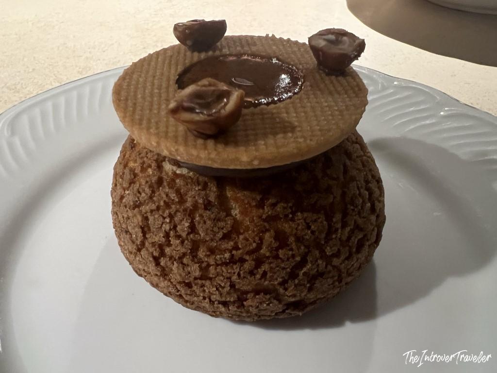 Chocolate hazelnut dessert with wafer disc and pralines, served at Trattoria Da Lucio Rimini