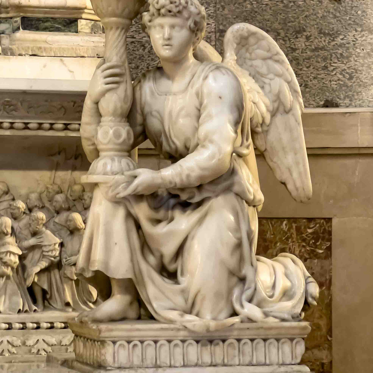 Kneeling angel holding a candlestick on the Ark of San Domenico, sculpted by Michelangelo, Bologna