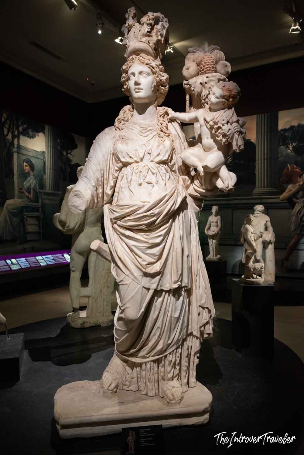 Marble statue of Tyche holding a child, on display at the Istanbul Archaeological Museum