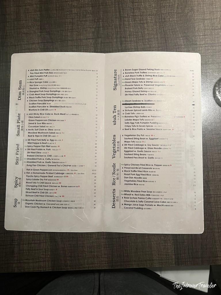 Open menu at Uluh restaurant in New York showing dim sum, stir fry, and signature Chinese dishes