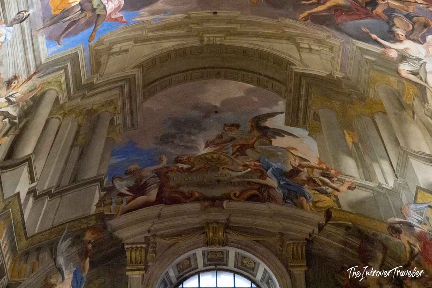 Baroque ceiling frescoes by Andrea Pozzo inside Sant'Ignazio church in Rome, with angels and trompe-l'oeil architecture