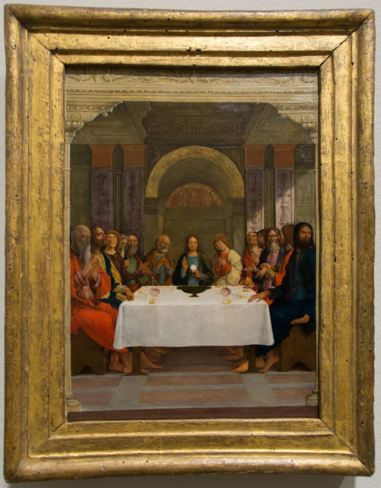 Renaissance painting of the Last Supper in a gilded frame, on display at the National Gallery London