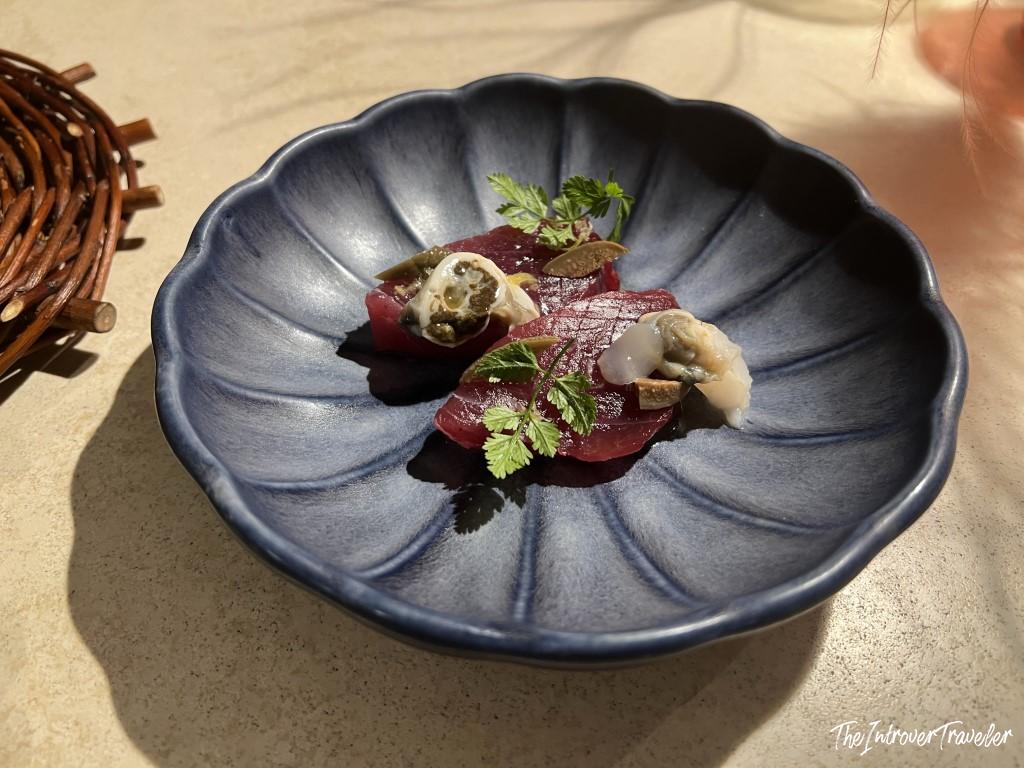 Elegant tuna carpaccio with oysters and truffle, served at Trattoria Da Lucio in Rimini
