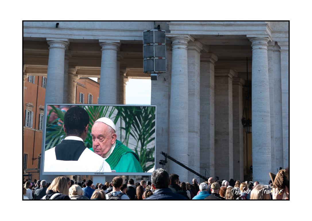 Pope Francis on a large screen during the Angelus in St. Peter's Square, Vatican City