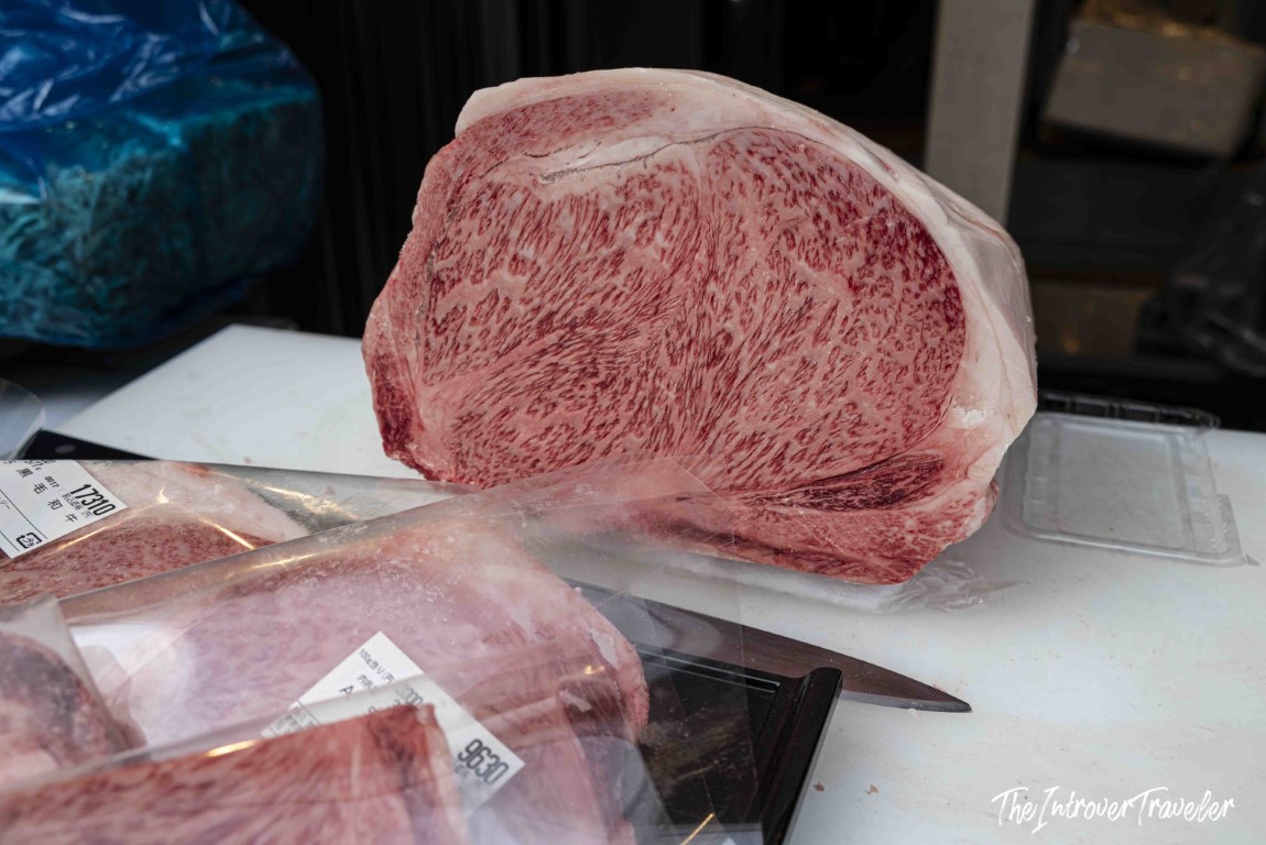 Heavily marbled raw wagyu beef block on display at Tsukiji market, Tokyo