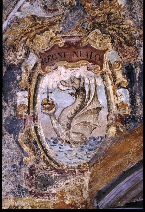 Faded coat of arms of the Kingdom of Naples, painted on the Archiginnasio Palace walls in Bologna