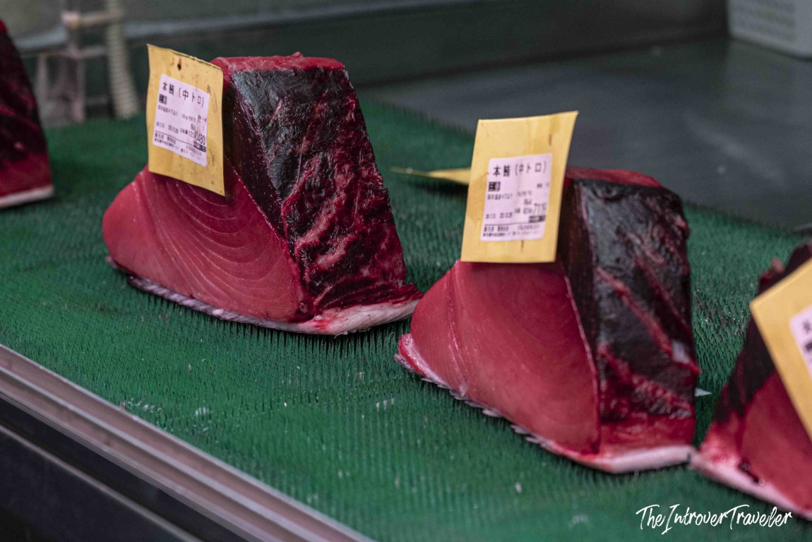 Fresh bluefin tuna cuts labeled hon-maguro on display at Tsukiji fish market, Tokyo