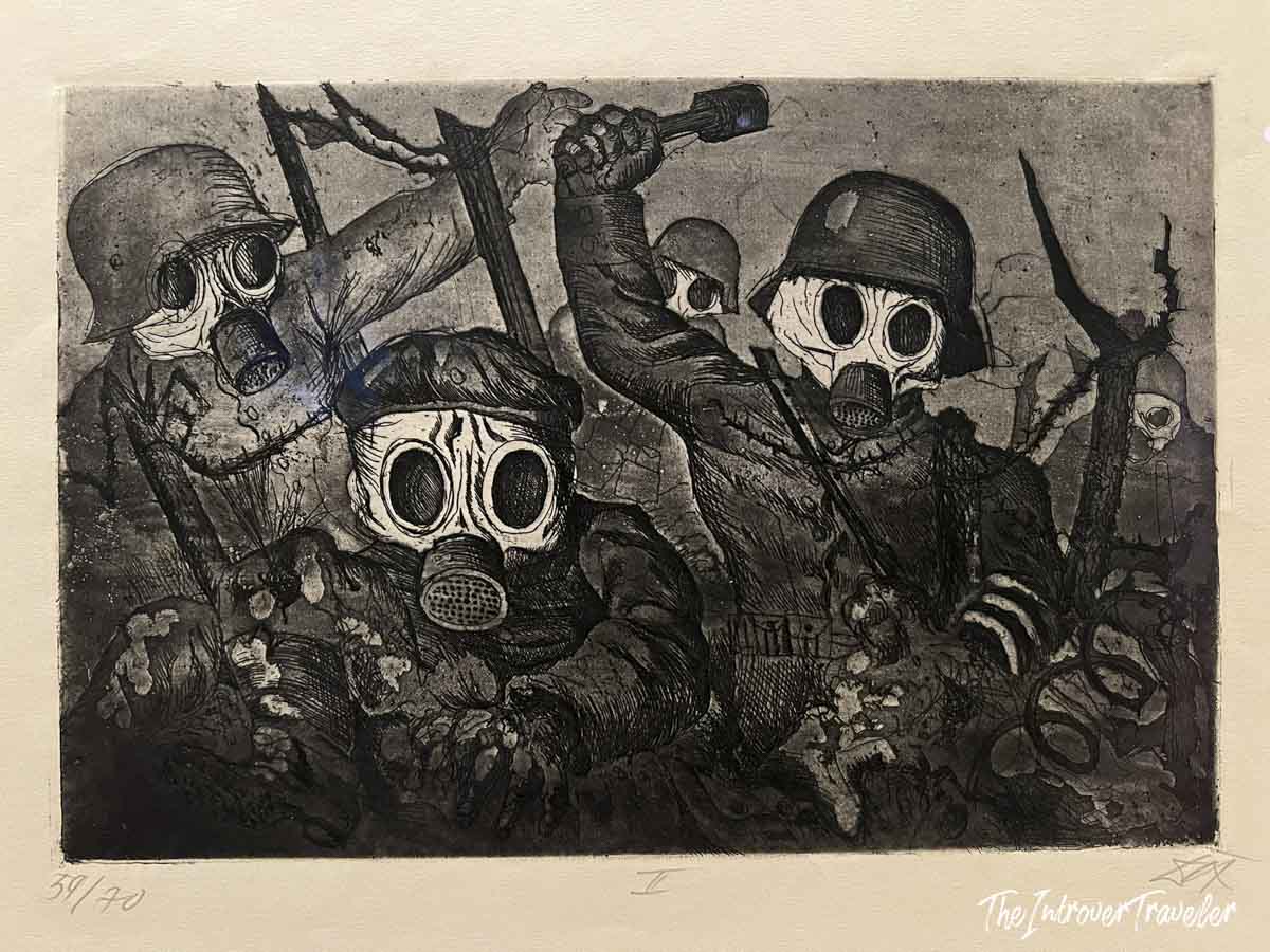 Otto Dix etching of gas-masked WWI soldiers charging, numbered print 39/70, at MoMA New York