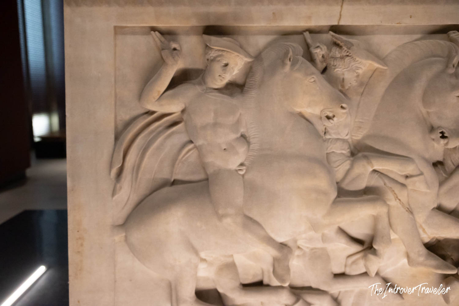Ancient Greek marble relief of a warrior on horseback, displayed at the Istanbul Archaeological Museum