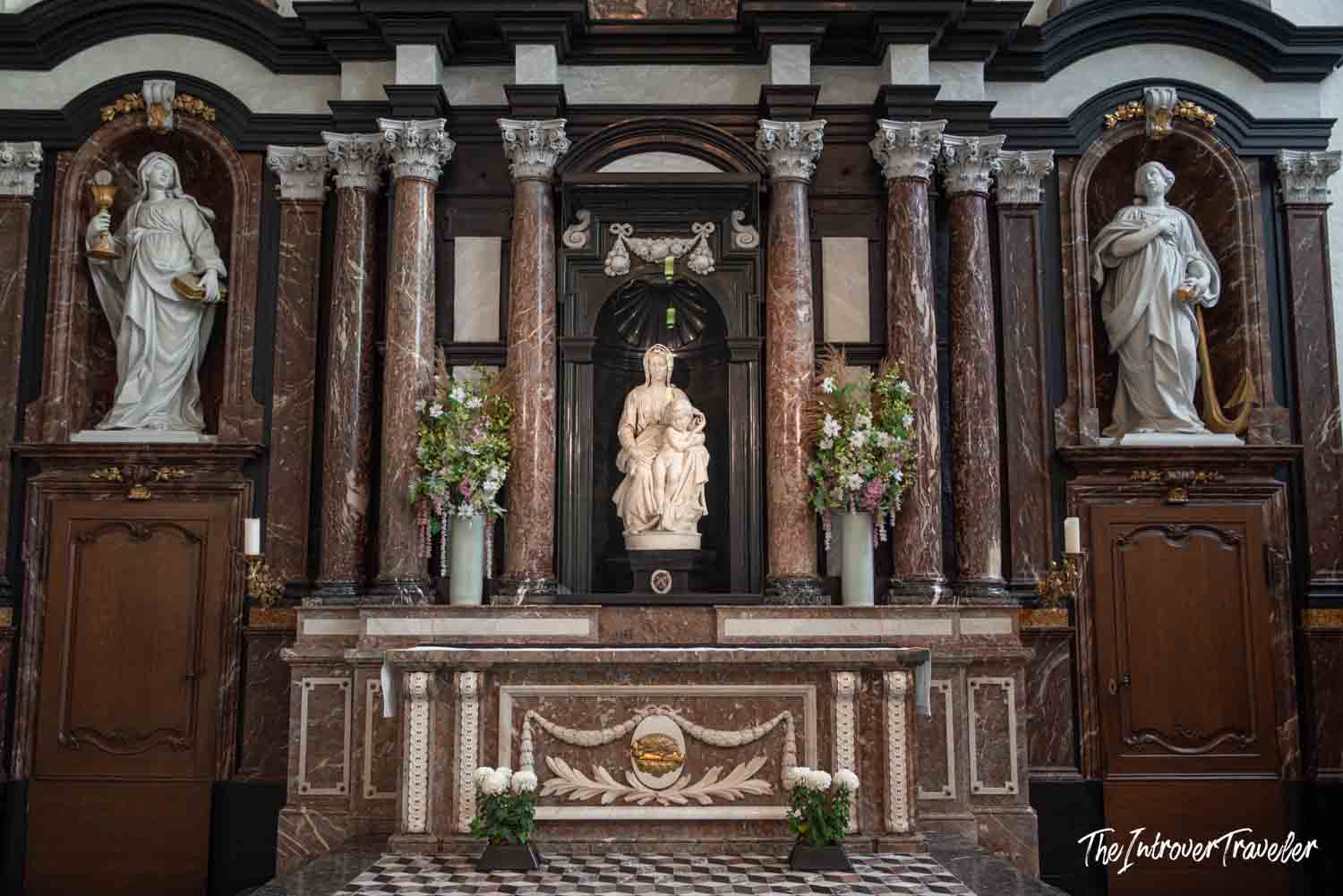 Michelangelo's Madonna of Bruges on the marble altar inside the Church of Our Lady, Bruges