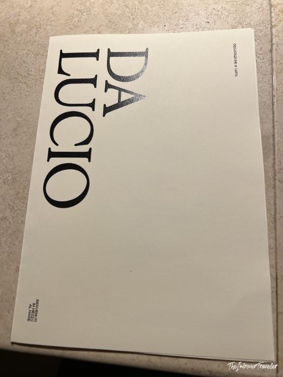 Menu cover of Trattoria Da Lucio, a fine dining seafood restaurant in Rimini, Italy