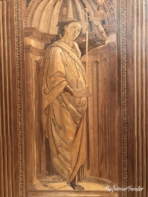 Intarsia wood panel in the Studiolo of Federico da Montefeltro, Urbino, depicting a robed classical figure