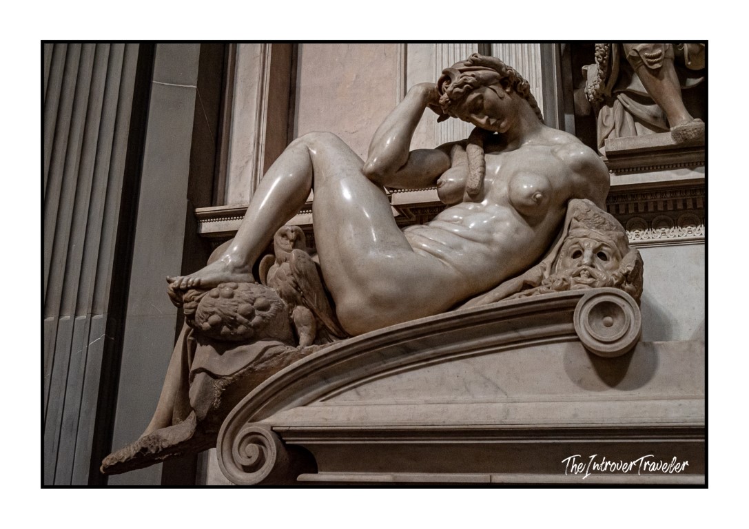 Night (La Notte) by Michelangelo, reclining on the Medici Tombs in Florence's New Sacristy