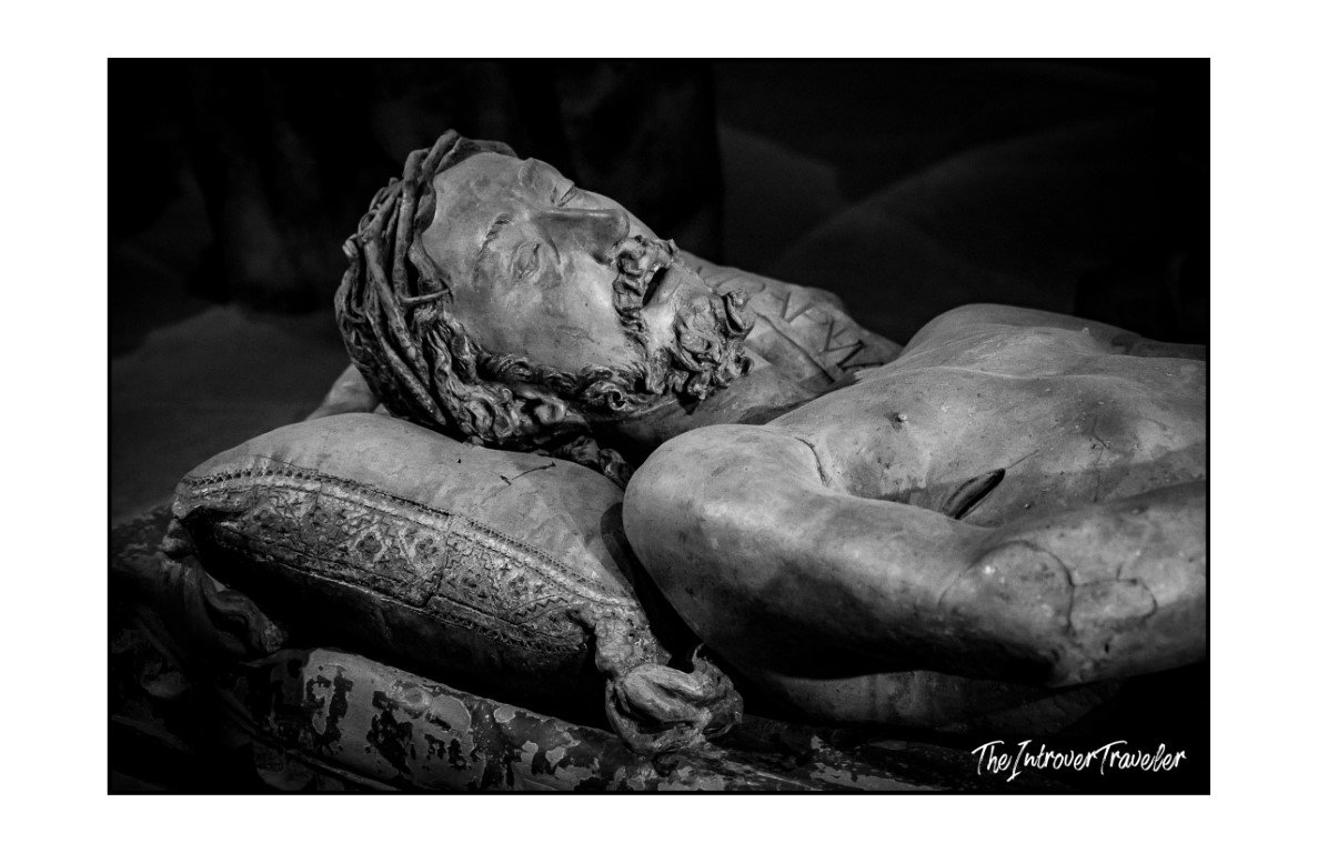 Close-up of the recumbent Dead Christ sculpture by Niccolò dell'Arca, Bologna, showing detailed face and torso