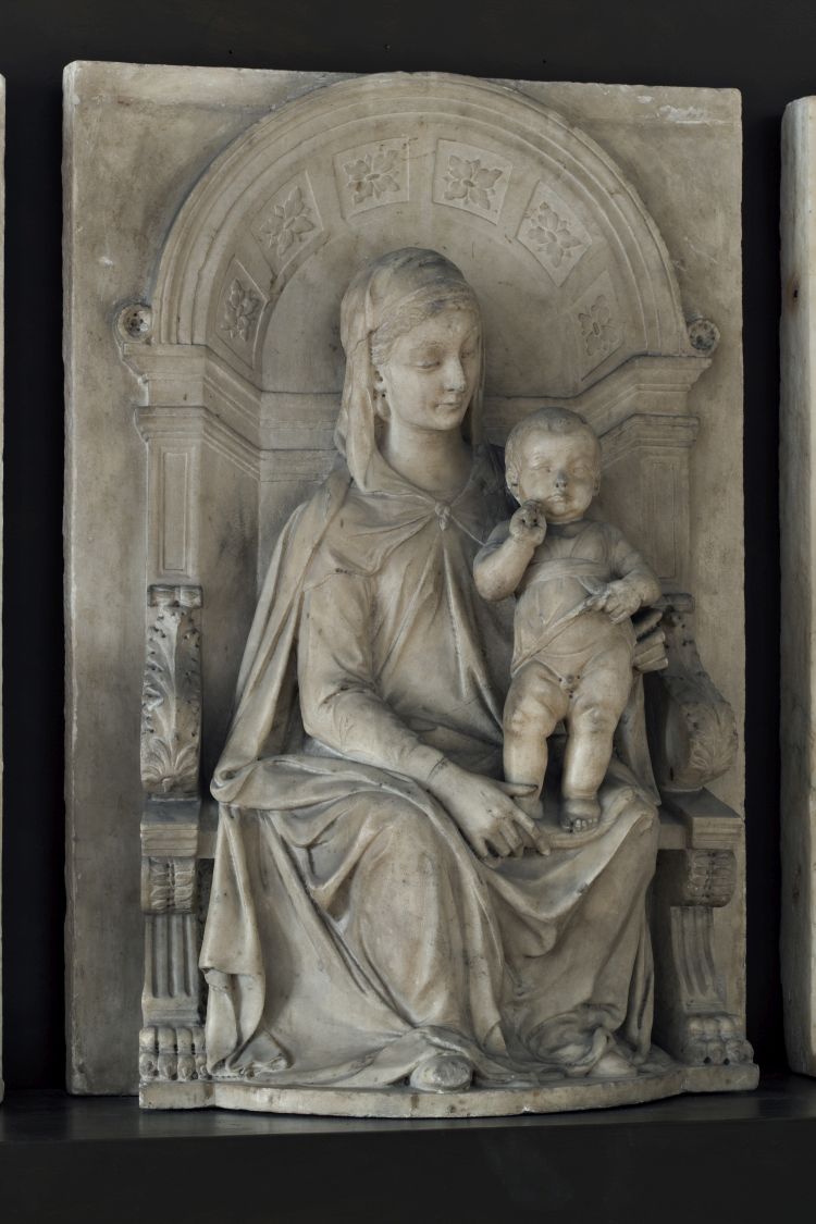 Marble Madonna and Child relief sculpture displayed at the Galleria dell'Accademia, Florence