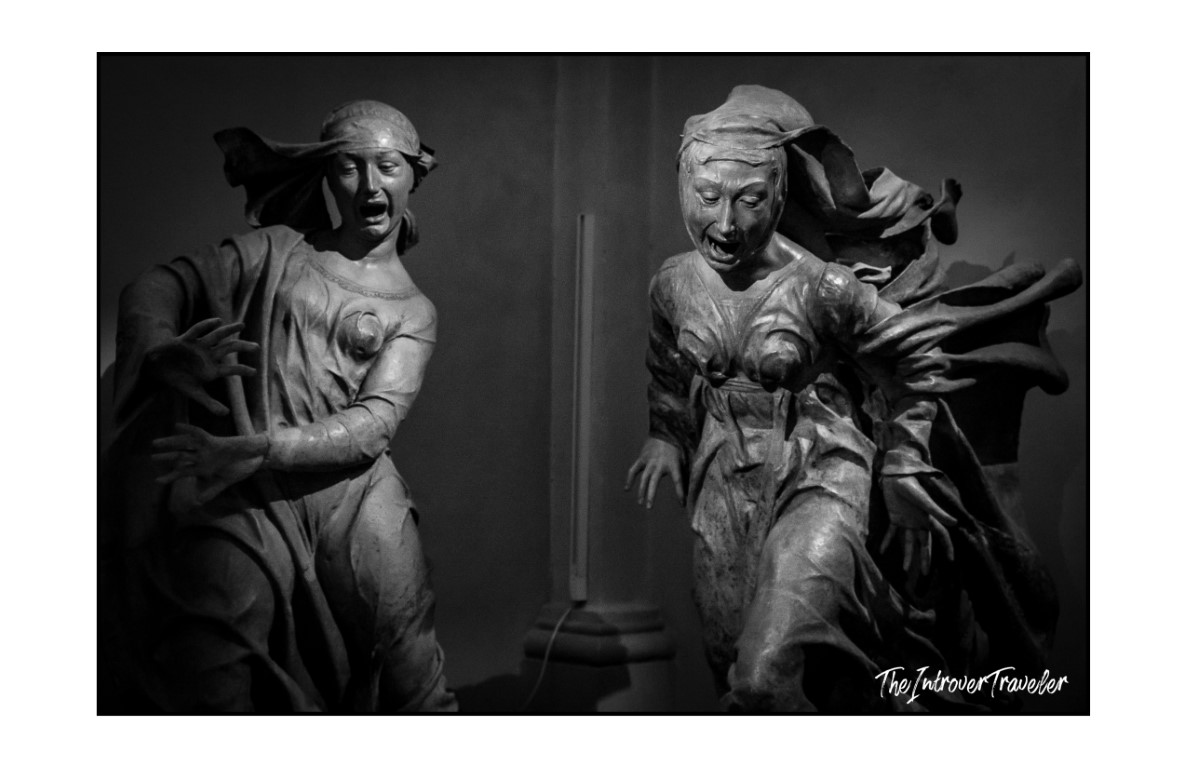 Two anguished female mourner sculptures from Niccolò dell'Arca's Lamentation over the Dead Christ, Bologna