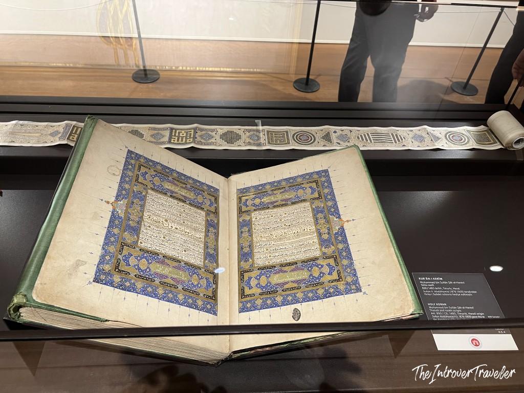 Illuminated Holy Quran manuscript on display in the Topkapi Palace treasury, Istanbul