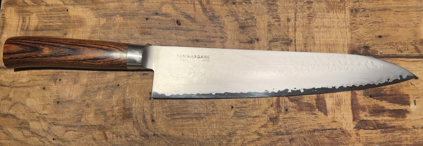 Tamahagane gyuto chef knife with wood handle, bought in Kappabashi Tokyo for around 200 euros