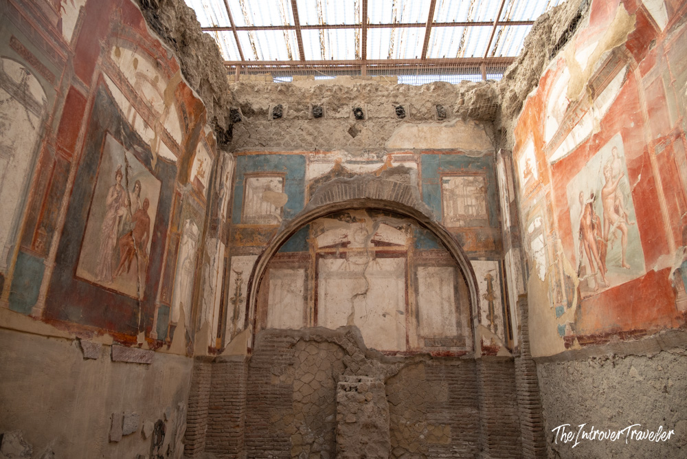 Colorful Roman frescoes covering the walls of an excavated room at Herculaneum, Italy